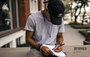 Student writing in a notebook