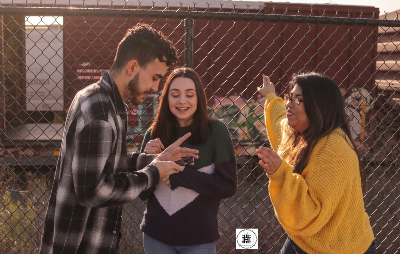 Teens talking to each other and laughing